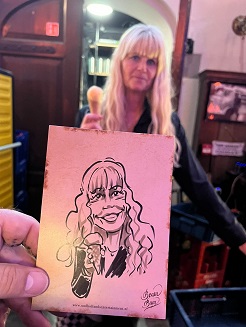 Karikaturist in Middeleeuwse kleding © www.middeleeuws-entertainment.nl